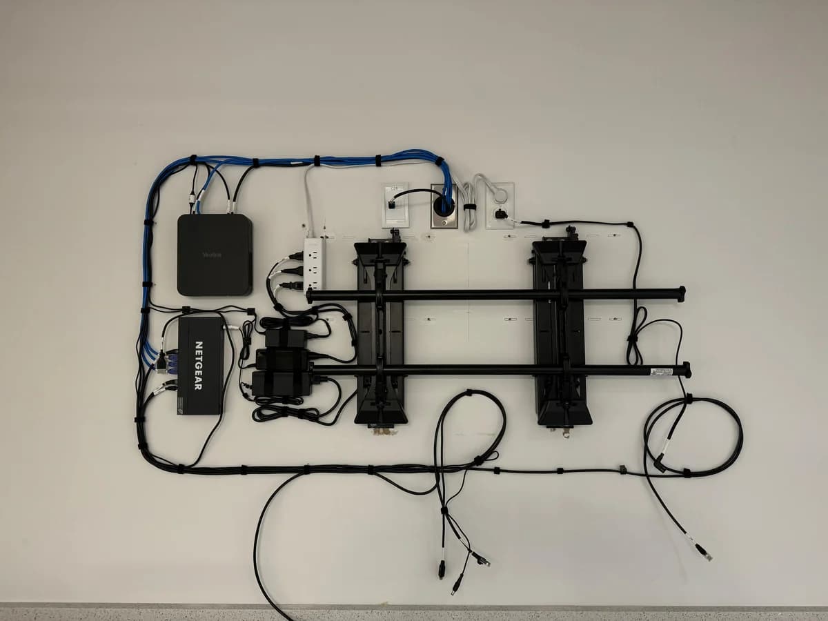 Clean in-wall cable management behind AV displays