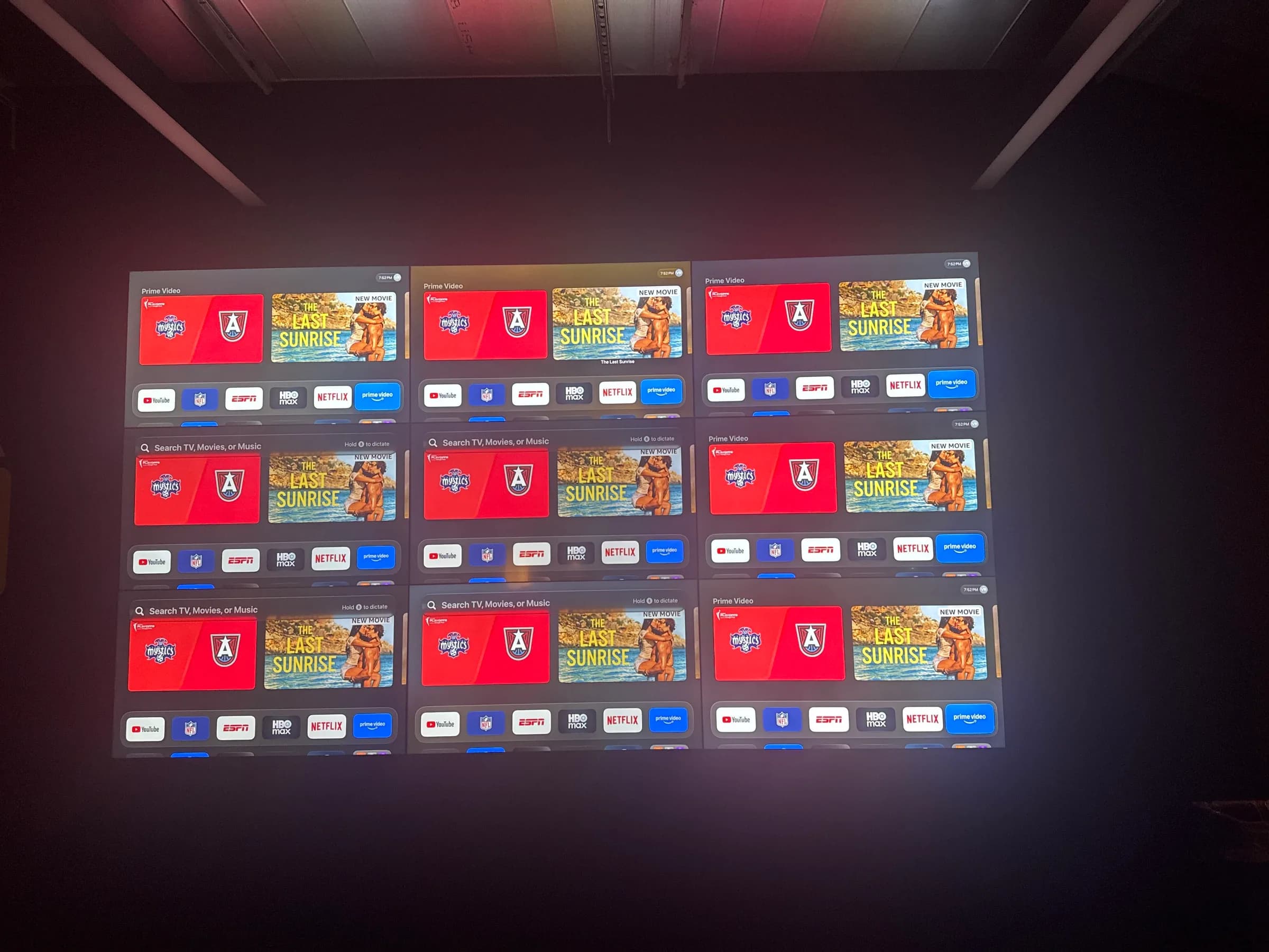 Straight-on view of a finished nine-screen Video Wall in a Brooklyn office